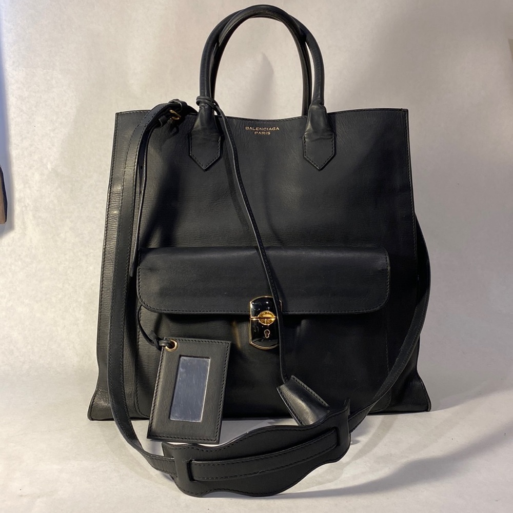 Balenciaga dark blue tote 13”W 12” L 61/2” Deep shoulder strap is approx 48”
